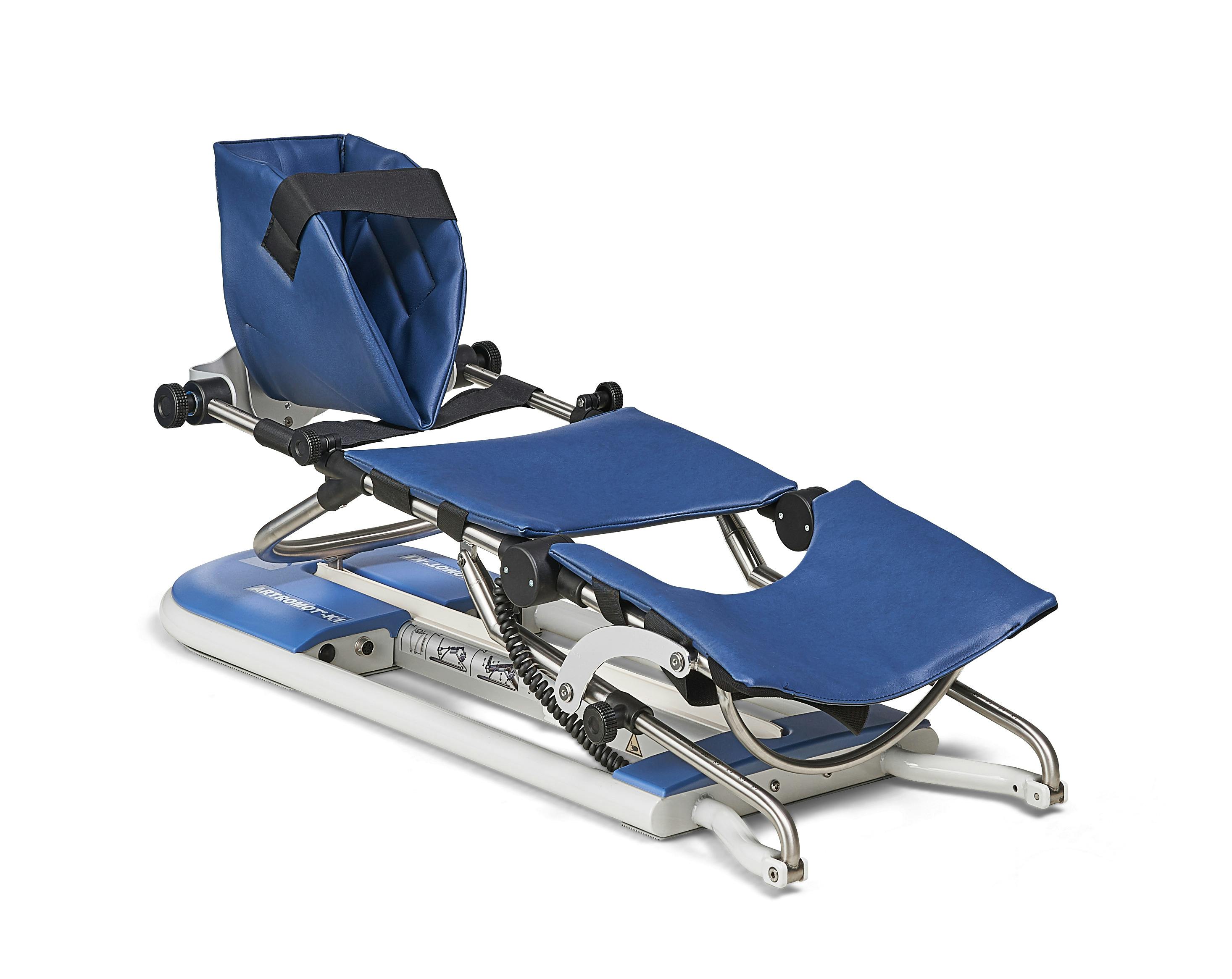 ARTROMOT®-K1 Produktbild mit Auflagen Motorisierte Bewegungsschiene für das Knie- und Hüftgelenk freigestellt